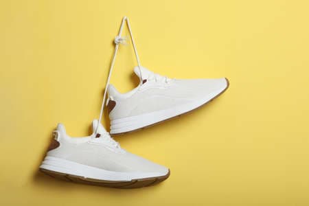 breathable white sneakers product photo