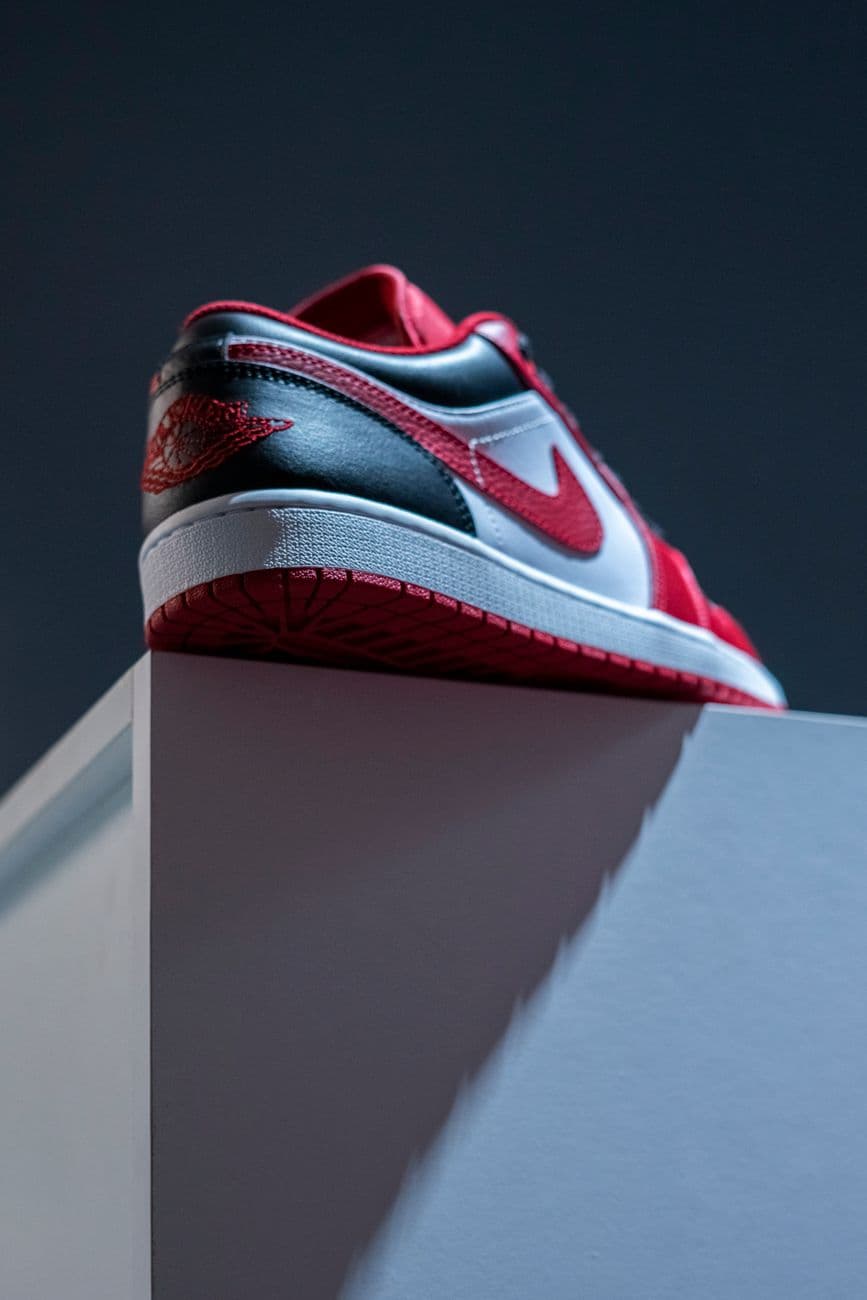 Bash – Durable Black-and-Red Nike Sneakers Built for Travel Adventures